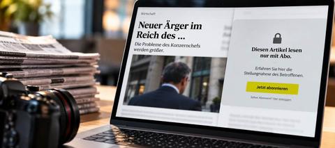 Laptop mit Online-Artikel und Paywall als Symbol für Verdachtsberichterstattung und Stellungnahmen hinter der Bezahlschranke.